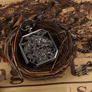 Vintage mechanical pocket watch in tungsten color with intricate hollow-out design