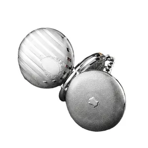 Vintage silver mechanical pocket watch with double-sided striped and textured covers