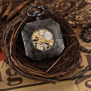 Vintage gunmetal-tone skeleton mechanical pocket watch with intricate floral relief