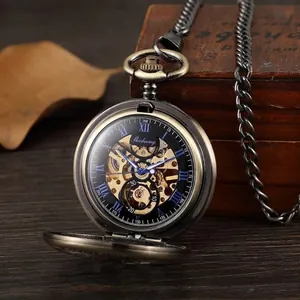 Montre à gousset squelette en bronze antique avec engrenages et chiffres romains