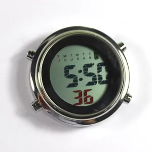 Macro view of a round digital nurse watch module showing time and weekday on LCD