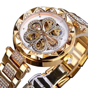 Close-up of a luxury women's skeleton automatic watch featuring elegant rhinestone accents.