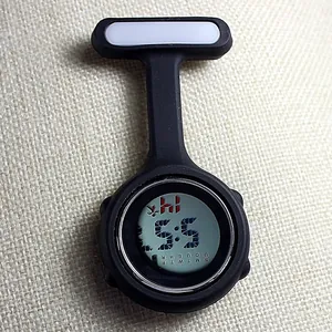 Detail view of black silicone digital nurse fob watch with date and time display