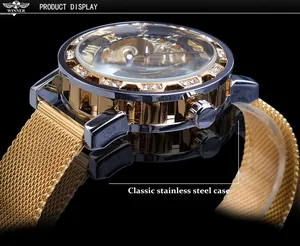 Detailed macro view of a classic gold stainless steel case on a manual mechanical watch.