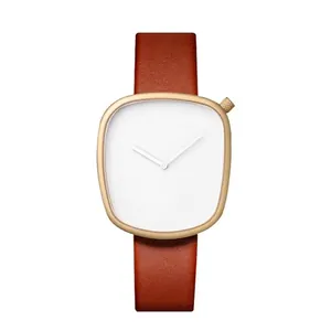 Reloj de cuarzo minimalista con forma de guijarro, esfera blanca y correa de cuero marrón