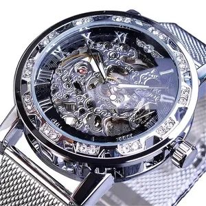 Close-up of Winner men's skeleton mechanical watch with rhinestone bezel and silver mesh strap