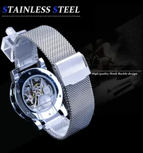 Detailed view of men's skeleton mechanical watch with silver mesh strap