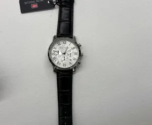 Detailed macro view of MINI FOCUS men's chronograph quartz watch with black leather strap