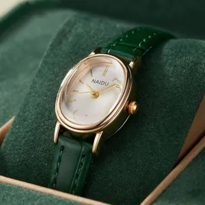 Montre à Quartz Elégante pour Femme avec Cadran Ovale Bracelet en Alliage de Style Bambou Montre-Bracelet Bijoux de Mode