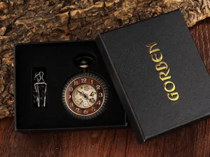 Detailed view of a vintage bronze mechanical skeleton pocket watch in a luxury GORBEN gift box
