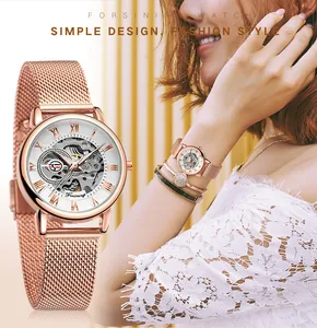 Detailed view of the Forsining rose gold skeleton mechanical watch with mesh strap