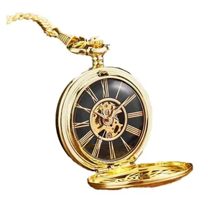 Montre à gousset mécanique dorée vintage avec cadran squelette et une longue chaîne