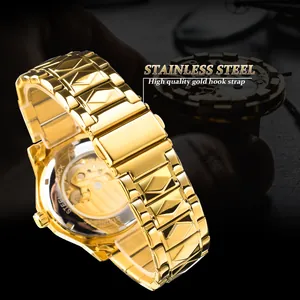 Close-up of gold stainless steel men's automatic watch with transparent back