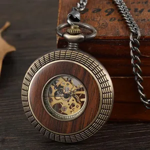 Vintage bronze mechanical pocket watch with hollow skeleton dial and luxury wood grain finish