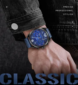 MINI FOCUS multifunctional quartz watch with blue dial and leather strap on male wrist