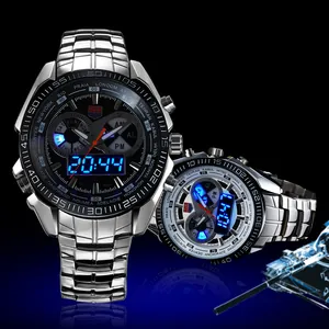 Close-up of TVG men's sports watch with dual display and blue LED backlight.