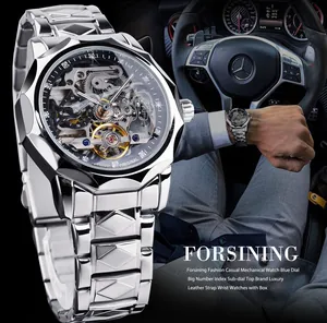 Close-up detail of men's skeleton mechanical watch with silver stainless steel link strap