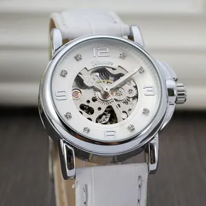 Macro view of Winner ladies skeleton automatic mechanical watch with white strap