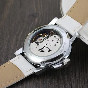 Close-up of the automatic mechanical movement and stainless steel back of the watch.