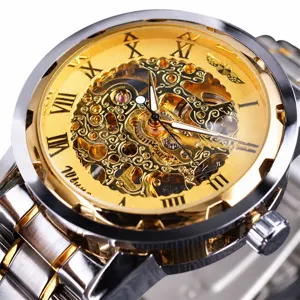 Macro view of WINNER men's skeleton mechanical watch with gold two-tone strap detail