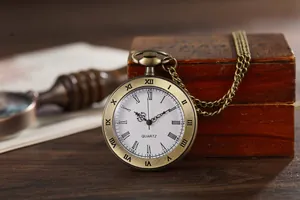 Detailed macro shot of a vintage bronze quartz pocket watch with Roman numerals