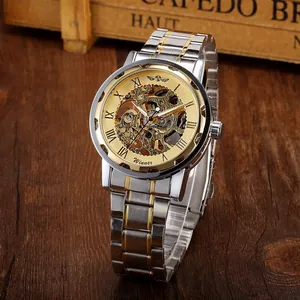 Reloj mecánico manual esqueleto Winner para hombre con correa en tono plata y oro