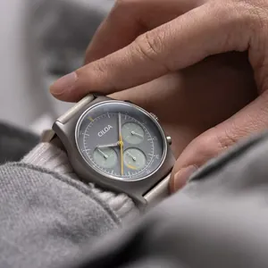 Close-up detail of CILOA men's solar powered chronograph watch featuring a matte grey dial