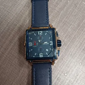 Retro stylish square quartz watch for men featuring a navy blue leather strap and date