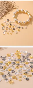 Detailed view of various metallic flower bead caps for DIY bracelet and necklace jewelry