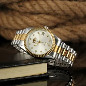 Orologio meccanico automatico bicolore di lusso con lunetta zigrinata e accenti dorati