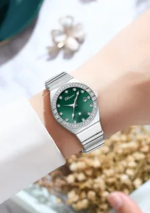 Elegant women's quartz watch with green sunray dial and rhinestone-encrusted silver bezel