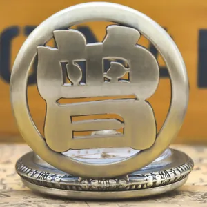 Detailed vintage bronze pocket watch with a hollowed Chinese surname character Zeng