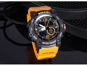 Detailed view of SMAEL sports watch with orange strap and black dual-display dial.