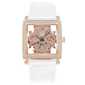 Elegant rose gold square watch featuring a spinning crystal dial and white leather band