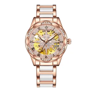 Detailed view of rose gold women's mechanical watch with rhinestone sunflower skeleton dial