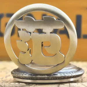 Close-up of retro hollow pocket watch with Chinese surname Fan design