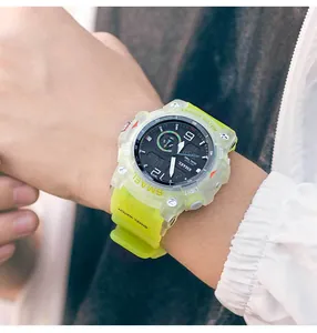 Macro view of SMAEL transparent lime green sports watch featuring dual-display dial