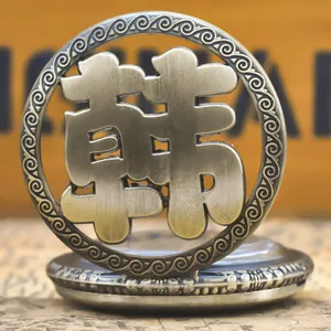 Exquisite vintage bronze pocket watch cover with a detailed hollow-out Chinese Han surname design.