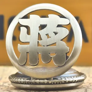Detail view of a vintage silver hollow pocket watch with the Chinese character Jiang.