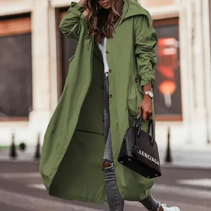 Stylish olive green hooded trench coat with large lapels and oversized casual fit.
