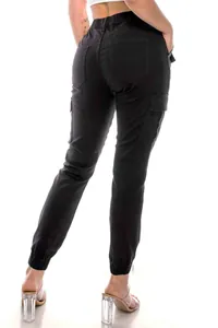 Back view of women's black multi-pocket cargo pants with elastic waist joggers.