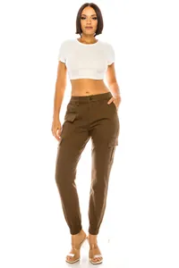 Women's brown multi-pocket cargo pants with elastic cuffs, outdoor casual style shot
