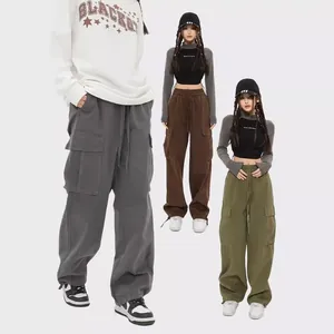 Pantaloni cargo vintage unisex in grigio, marrone e verde oliva streetwear.