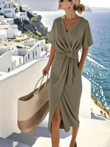 Elegant olive green satin wrap dress featuring a front twist detail and side slit.