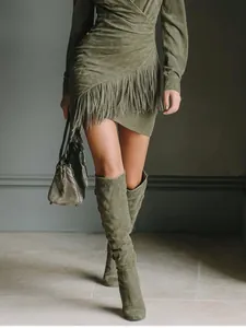 Elegant Western style olive green suede dress with fringe details and matching boots.