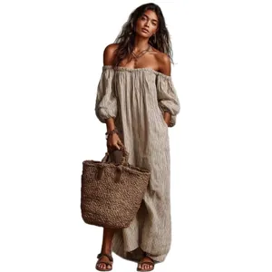 Elegant off-the-shoulder striped maxi dress for a casual summer beach vacation look.