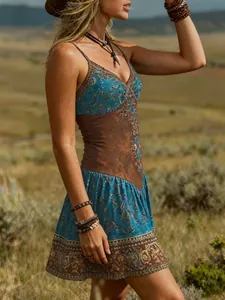 Vestido lencero vintage con escote en V y estampado paisley azul y marrón detalle