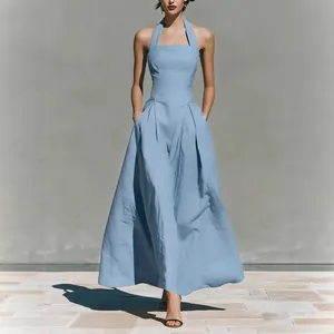 Elegant light blue halter neck maxi dress with pockets in premium linen-like fabric