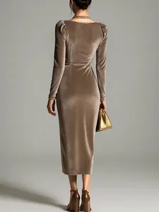 Back view of elegant brown velvet long sleeve bodycon midi dress with puff sleeves