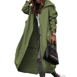 Close-up detail of a women's olive green long hooded trench coat with large lapels.